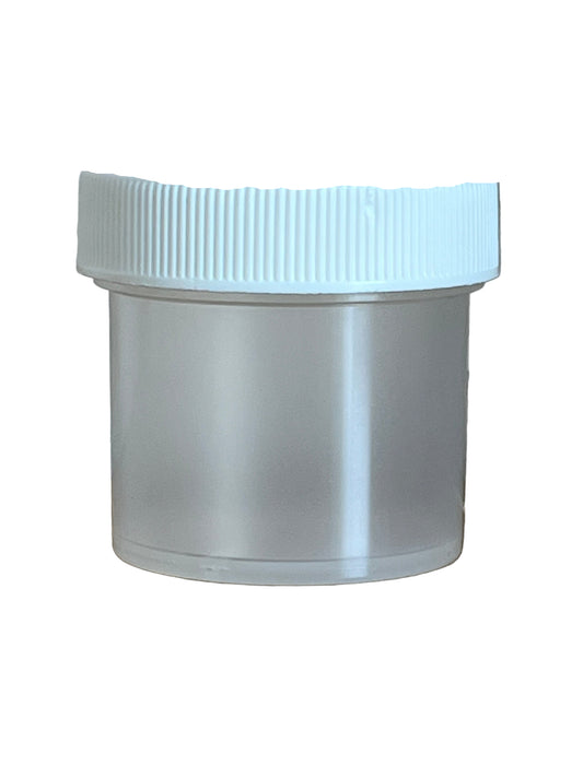 White cylindrical object with a textured wall and wooden surface in the background